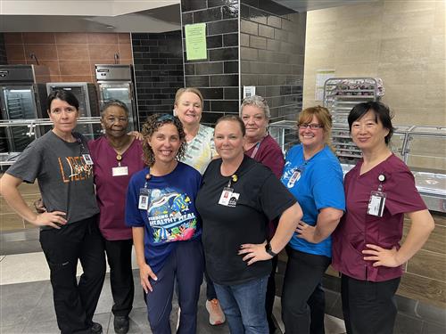 CNP staff at Liberty Middle pose in kitchen for a pic